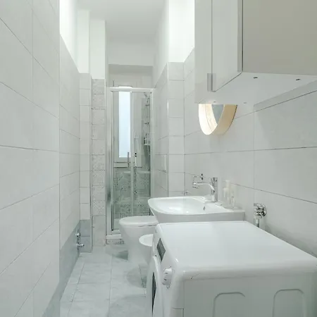 Guesthost - Comfy Flat In Apartamento
