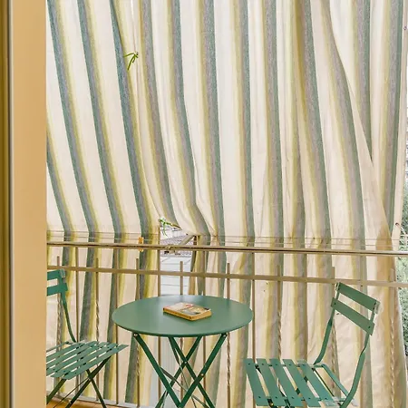 Guesthost - Comfy Flat In Apartamento